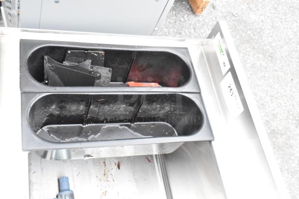 BRAND NEW Regency 600IB2130 21x30" stainless steel underbar ice bin with bottle holders, scratch and dent condition.