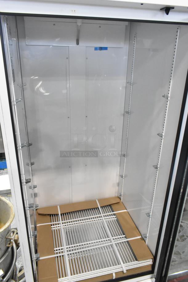 BRAND NEW 2021 True Metal Single Door Cooler, Scratch and Dent, Poly Coated Racks, 115V, 1 Phase, Empty Interior View.
