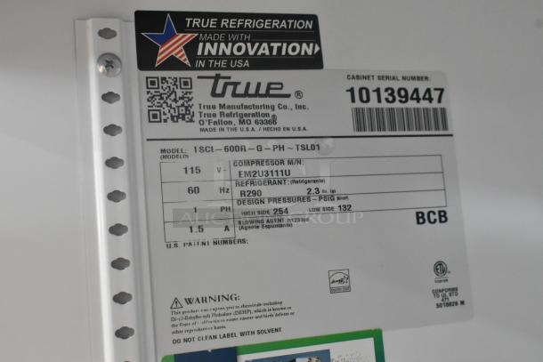 Alt Text: True commercial cooler label with serial number 10139447. Model TSCI-600R specs include 115V, uses R290 refrigerant.