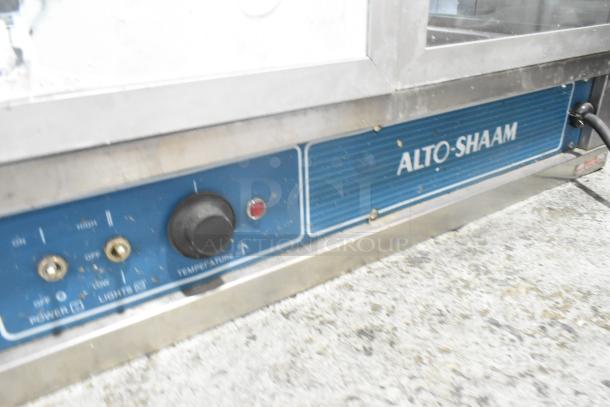 Alto Shaam stainless steel heated display case, 115V, 1 Phase. Features power and temperature controls on the front panel.