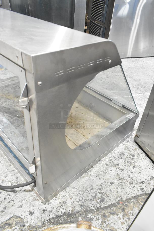 Alto Shaam stainless steel countertop heated display case, 115V, 1 phase, with clear glass panels, used condition.