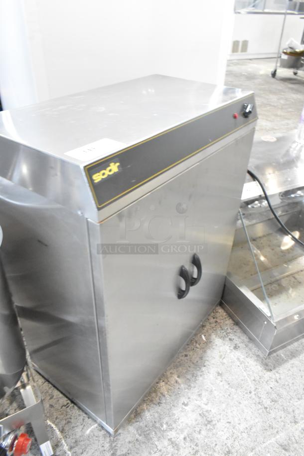Sodir stainless steel commercial 2-door reach-in warming cabinet, 115 volts, 1 phase. Appears in used condition.