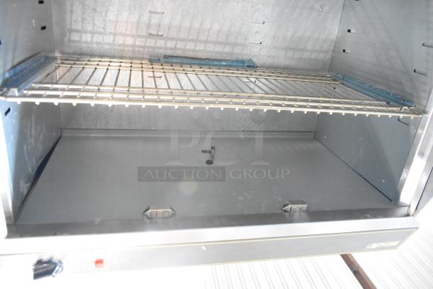 Sodir stainless steel 2-door warming cabinet, commercial use, 115 volts, features metal racks, clean interior, sturdy build.