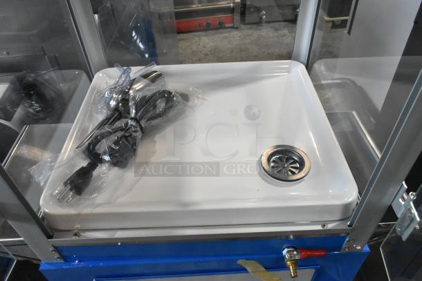 BRAND NEW Carnival King 382SCM350R Sno Cone Machine, commercial floor model, 120V, 1 phase, minor scratches, power cord included.