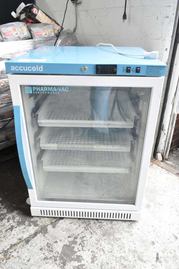 Accucold ARG6PV456 metal mini cooler merchandiser, 115V, single phase, glass door, four adjustable shelves, excellent condition.