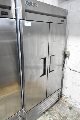2022 True T-35-HC stainless steel 2-door commercial reach-in cooler with poly racks, 115V, 1 Phase, excellent condition.