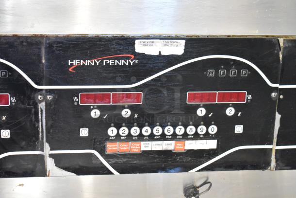 2016 Henny Penny EEG-243 FFFX ST fryer control panel with labels for operation modes and cooking settings.
