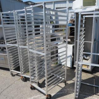 Aluminum speed rack on casters, 20.5x26x69 inches, used condition, multi-shelf design for kitchen storage.