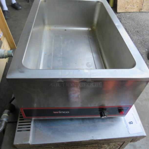 Winco FW-S500 food warmer, stainless steel, 120V, 14.5x22.5x9 inches, manual control knob, used condition.