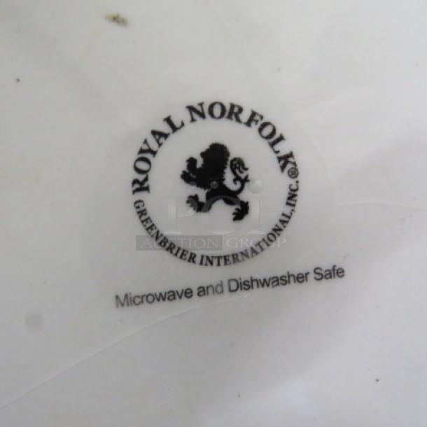 10.5-inch Royal Norfolk plate, marked "Greenbrier International, Inc.," microwave and dishwasher safe, logo visible.