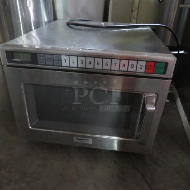 Panasonic microwave, Model NE-17521, stainless steel, 208-240 Volt, keypad controls, 16.5x21x13 inches, used condition.