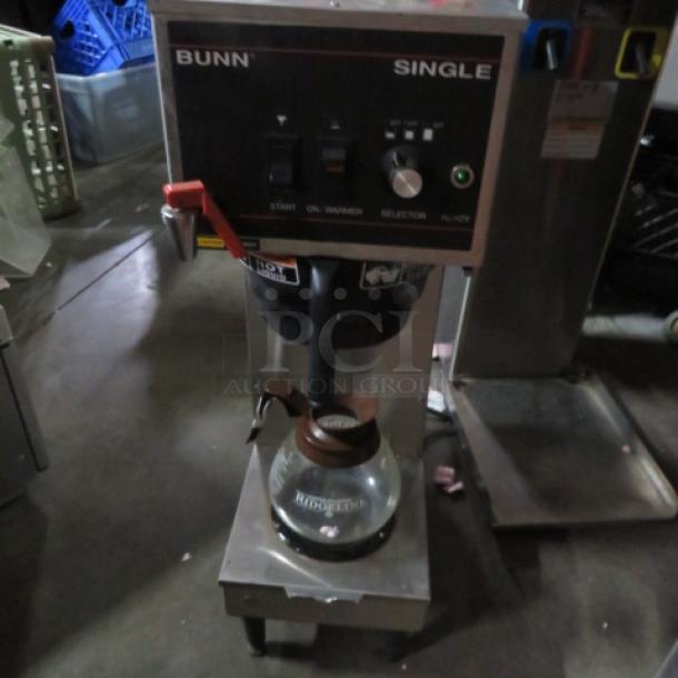 Bunn Single Coffee Brewer with filter basket and pot, Model Single B, 120 Volt, 9.5x18x29.5, in used condition.