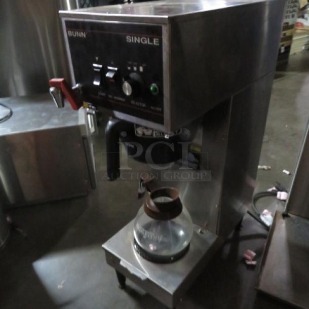 Bunn Single B coffee brewer with filter basket and pot, 120V, stainless steel, 9.5x18x29.5 inches, used condition.