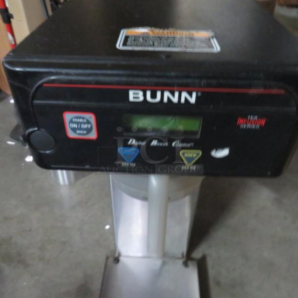 Bunn ITB tea brewer, 120V, 12x24x34 inches, with filter basket. Features digital controls, in good condition.