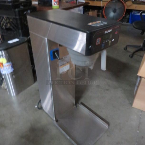 Bunn ITB tea brewer with filter basket, Model# ITB, 120 Volt. Stainless steel, good condition, 12x24x34 inches.