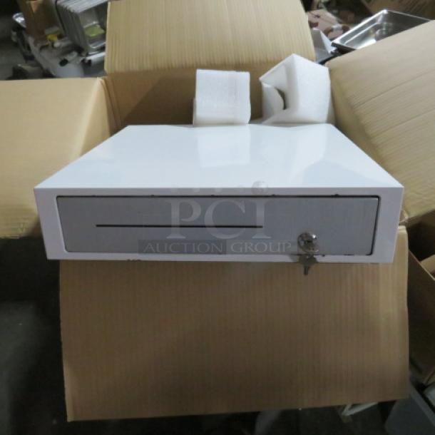 White Clover cash drawer with key, in good condition. Features a front key lock and note slot.