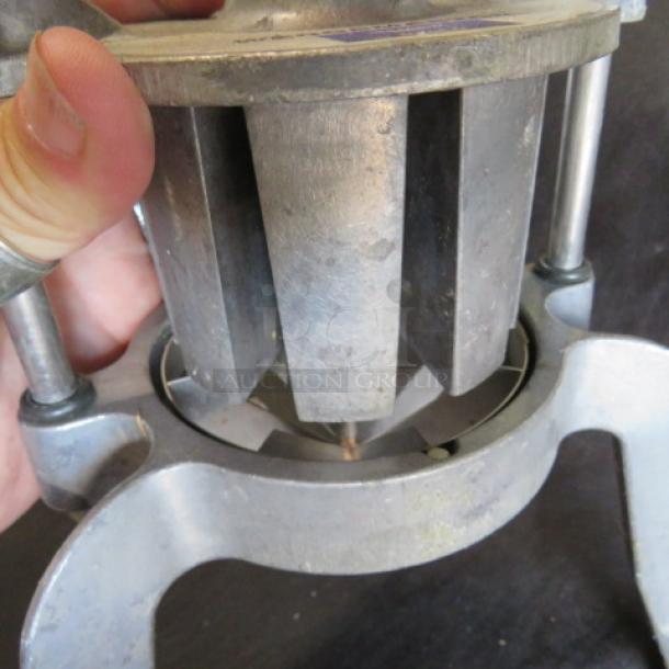 Vollrath Wedgemaster slicer; metal construction, used condition, visible blades, sturdy frame, suitable for food prep.