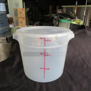 6-quart round food storage container with lid, clear plastic, marked in red measurements, excellent condition.