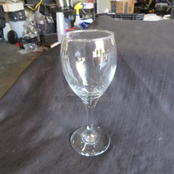 Clear stem wine glass, model 12XBID, in excellent condition. Glass is transparent with a sleek design, no visible markings.
