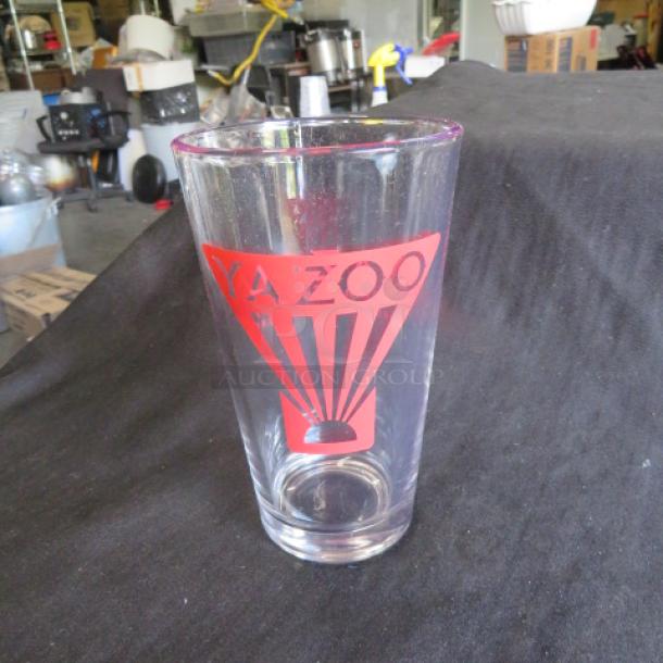 NEW Yazoo Beer Glass with red logo, pristine condition, perfect for collectors or beer enthusiasts.