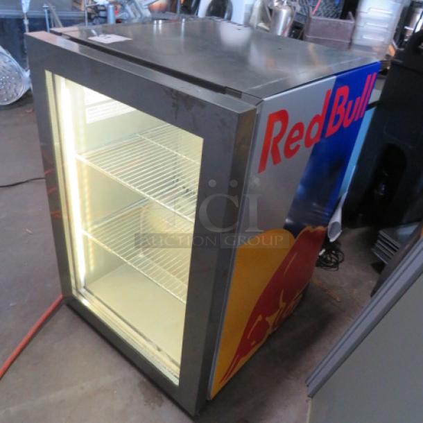 Red Bull glass door refrigerator, 2 racks, removable SS cover, Model VC206484016, 115V, 16x18x23 inches.