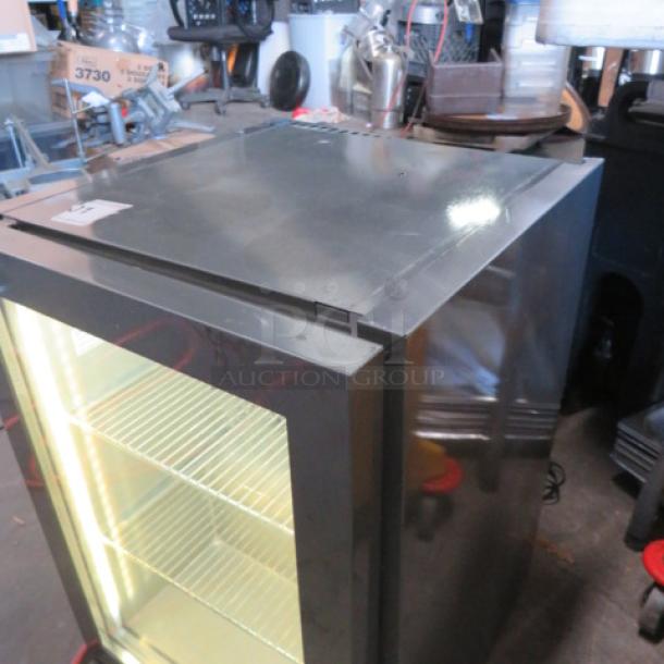 Red Bull glass door refrigerator, model VC206484016, with 2 racks and removable stainless steel cover, 16x18x23 inches, 115V.