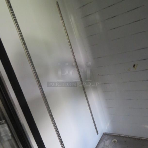 Everest EMGR24 glass display cooler interior, white shelving slots, clean condition, model and size tags visible.