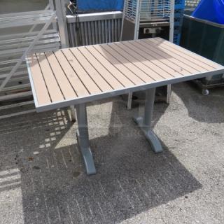 BFM synthetic teak and aluminum patio table, 48x32x30 inches. Sturdy, weather-resistant, ideal for outdoor use.