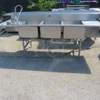 One Stainless Steel 3 Compartment Sink With R/L Drain Boards, And Faucet With Hose Sprayer. 103X35X45. Sink 20X28X12. - Item #1206215