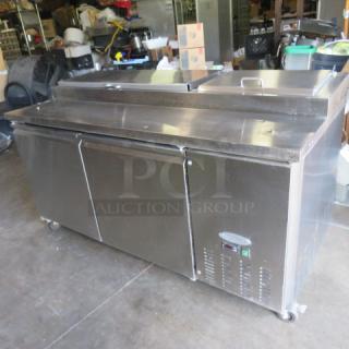 One WORKING Servware 2 Door Refrigerated Prep Table On Casters. Model# PP67-9. 115 Volt. 71X32X40. $4283.00 - Item #1206216