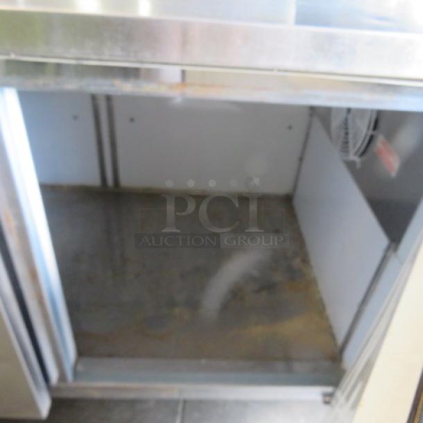 Servware 2 Door Refrigerated Prep Table, Model PP67-9. 115 Volt. Stainless steel, 71x32x40 inches, on casters.