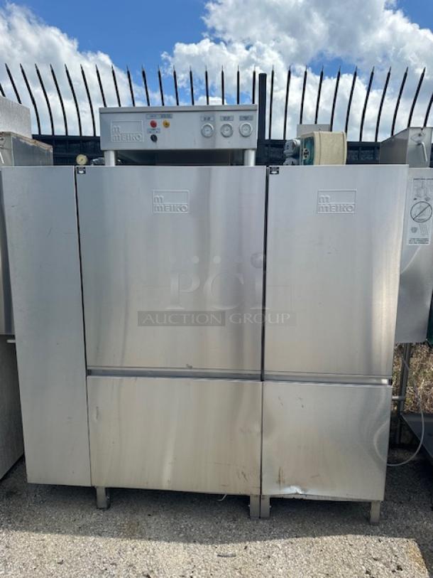 Meiko Conveyor Dishwasher, Model K66ET, 460V, 3 Phase, 82x32x75, stainless steel, used condition. Control panel on top.