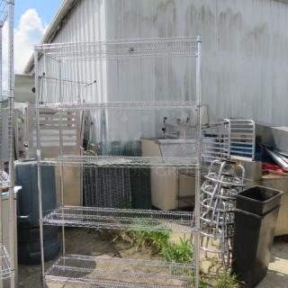 Metro shelving unit with five wire shelves, dimensions 54x18x87 inches, in used condition.
