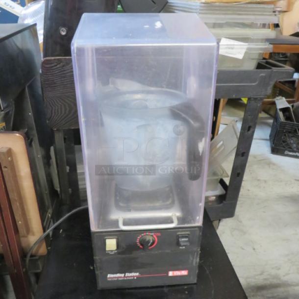 Vitamix Blending Station VMO115A, 120V, with protective shield, used condition, visible control panel with dials and buttons.