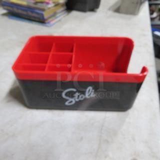 Stoli Bar Organizer, new condition, black and red plastic with compartments, Stoli logo on the side.