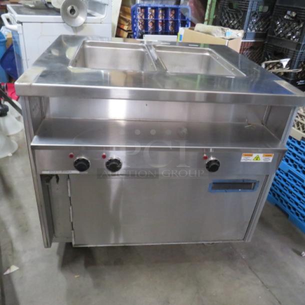 Randell 2-well warmer on casters, model 31330, with 1-door under warmer, 208V, 1 phase, 36x36x36, priced at $3895.00.