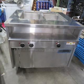 Randell 2-well warmer on casters, model 31330, with 1-door under warmer, 208V, 1 phase, 36x36x36, priced at $3895.00.