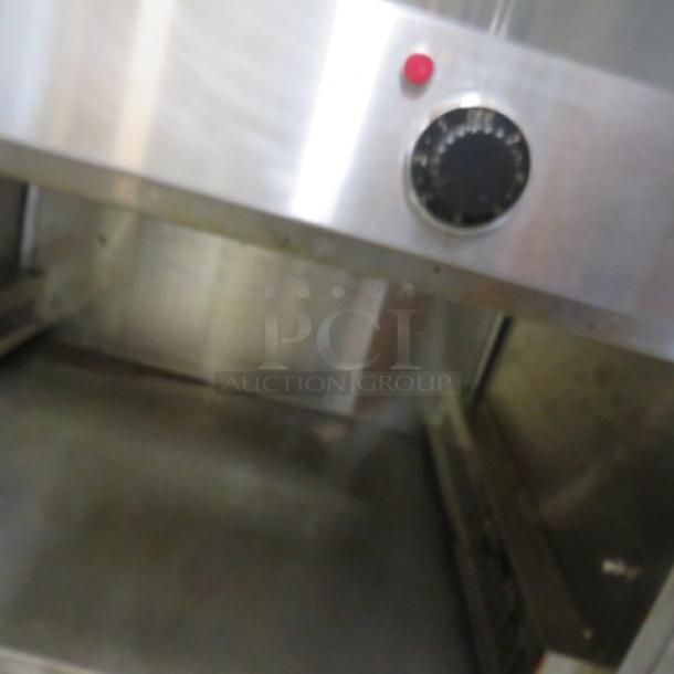 Randell 2 Well Warmer, Model 31330, stainless steel, 36"x36"x36", with door under warmer, 208V, on casters.