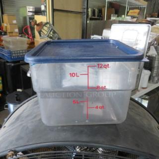 12 Quart food storage container with lid, clear with red measurements in quarts and liters, blue snap-on lid.