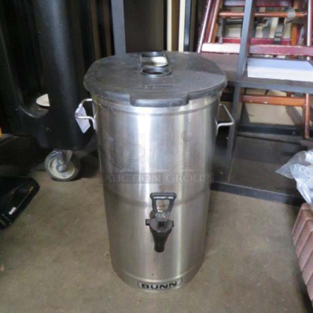 Bunn Stainless Steel Satellite with lid, used condition, visible Bunn branding, equipped with a spigot and handles.