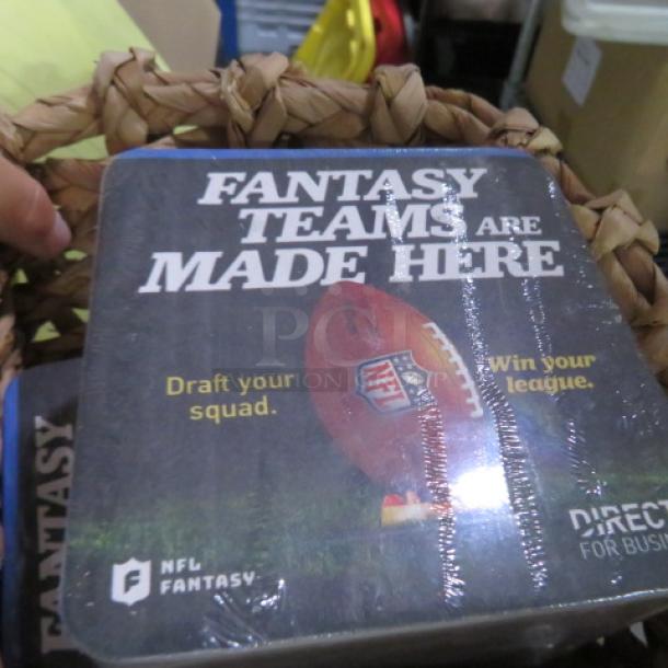 One basket of new bar coasters, featuring NFL Fantasy branding, wrapped in plastic, woven basket visible.