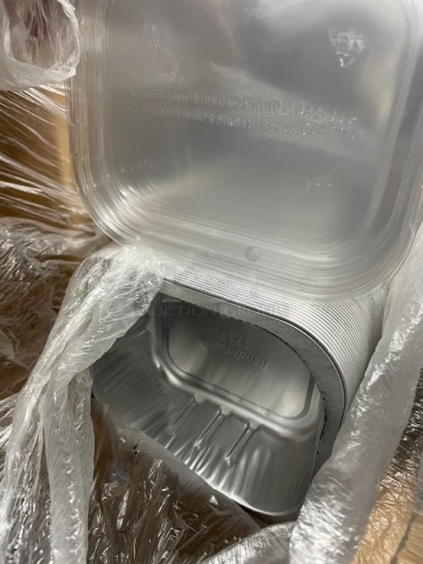 HFA Gourmet-To-Go 20 oz. aluminum containers with clear dome lids, model 4217-45-150WDL, brand new on a pallet.