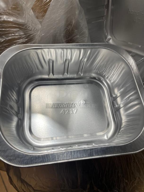 HFA 20 Oz. aluminum take-out container, model 4217-45-150WDL. Smoothwall design, brand new, includes clear dome lids.