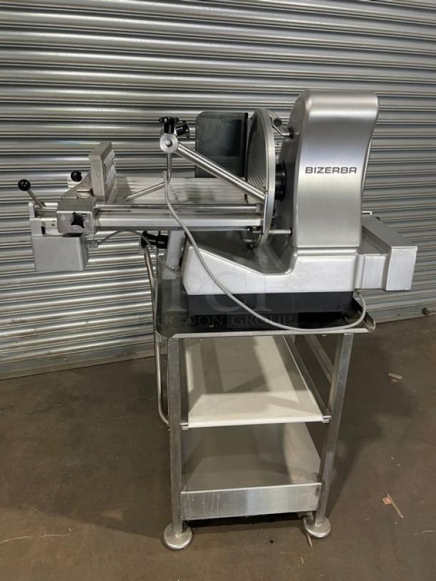 Bizerba VS12DV commercial deli slicer, vertical automatic, stainless steel with undershelf table and retractable casters.