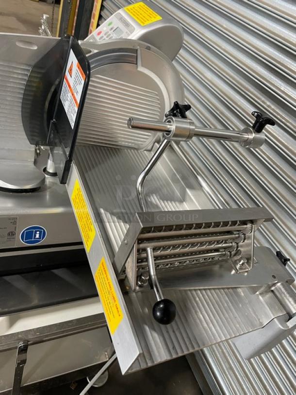 Bizerba VS12 D-V electric deli slicer with shingle/stacking function, undershelf stand, and retractable casters, 120V.