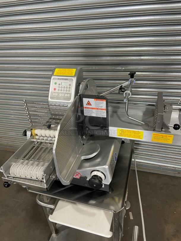 Bizerba VS12DV commercial electric deli slicer, automatic shingle/stacking, with undershelf stand, retractable casters, 120V.