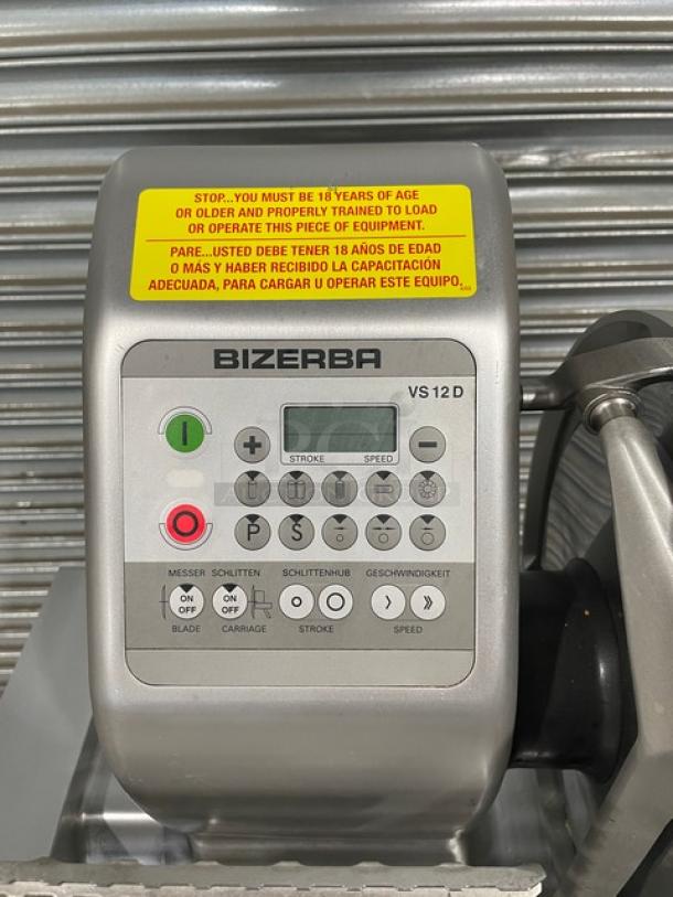 Bizerba VS12DV deli slicer, commercial electric, automatic, with control panel buttons and caution label, 120V.