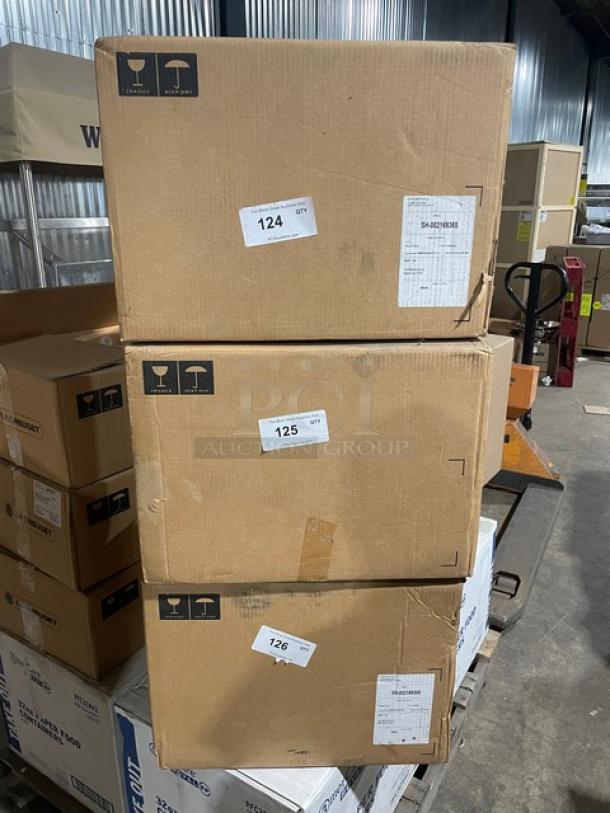 New Le Creuset 6-3/4 Qt. Signature Oval Dutch Oven in box. Enameled cast iron, includes lid, several boxes stacked.