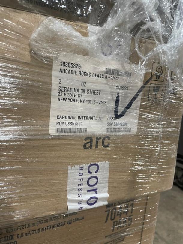Mixed pallet with brand new commercial goods, including Arc Cardinal Arcadie rocks glasses, labeled and wrapped for auction.