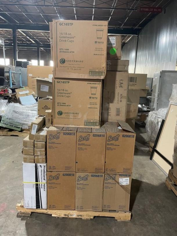 Mixed pallet with Scott paper towels, Greenware drink cups, eyewear, C.A.C. platter, and F.O.H. holder in warehouse.
